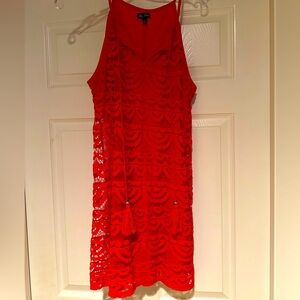 Lily Rose Red sundress.  Lace over red liner. Tassel tied in front